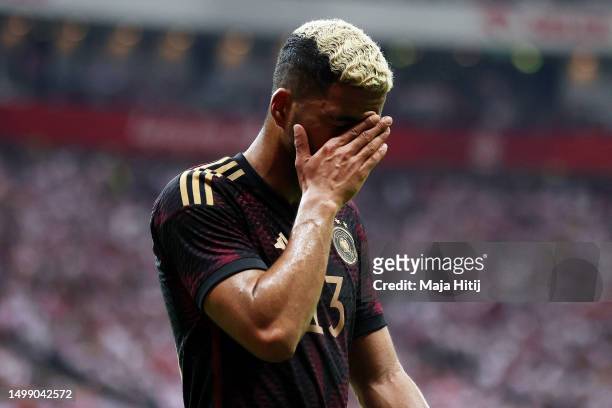 Benjamin Henrichs of Germany reacts after being substituted off during the international friendly match between Poland and Germany at Stadion...