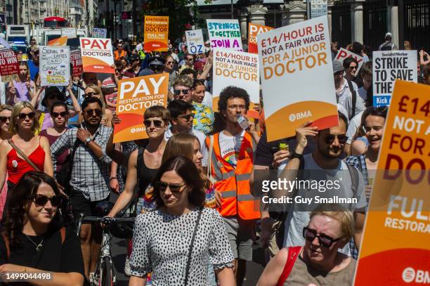 Striking Junior Doctors march from the BMA HQ to Parlaiment square on June 16, 2023 in London, England. The British Medical Association has been...