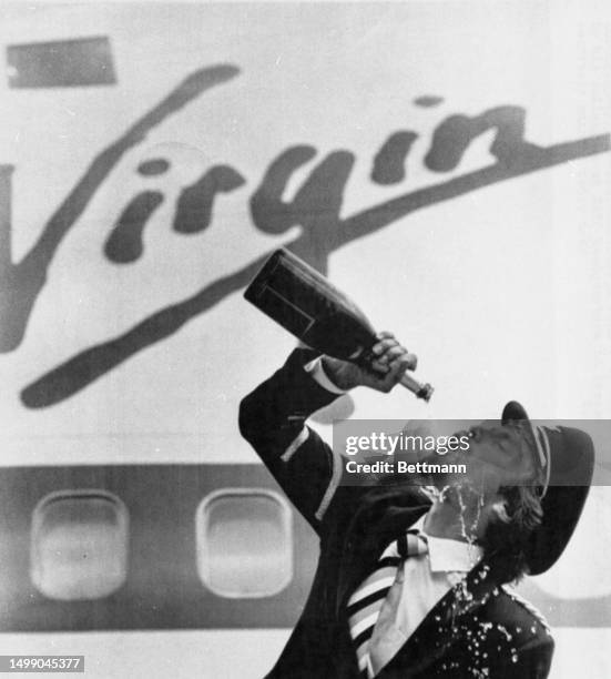 Richard Branson, the 33-year-old British pop music millionaire launches the maiden flight of his transatlantic airline, Virgin Atlantic, with a...