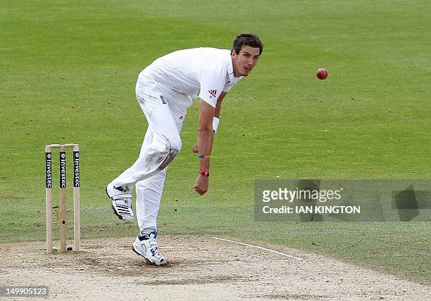 England's Steven Finn bowls on August 6, 2012 during day 5 of the second international test cricket match between England and South Africa at the...