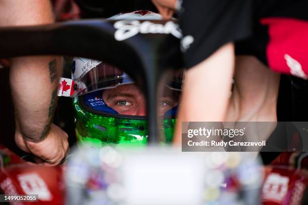 Valtteri Bottas of Finland and Alfa Romeo F1 prepares to drive in the garage during practice ahead of the F1 Grand Prix of Canada at Circuit Gilles...