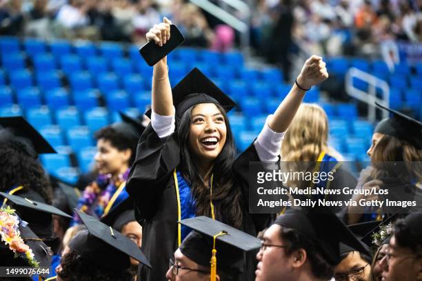 Los Angeles, CA Communication major Ysabelle Nina Lagman Salatar celebrates as Latin honors are recognized during UCLAs commencement ceremony in...