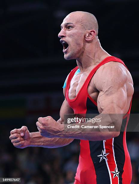 Karam Mohamed Gaber Ebrahim of Egypt celebrates winning his Men's Greco-Roman 84 kg Wrestling Semi Final against Damian Janikowski of Poland on Day...