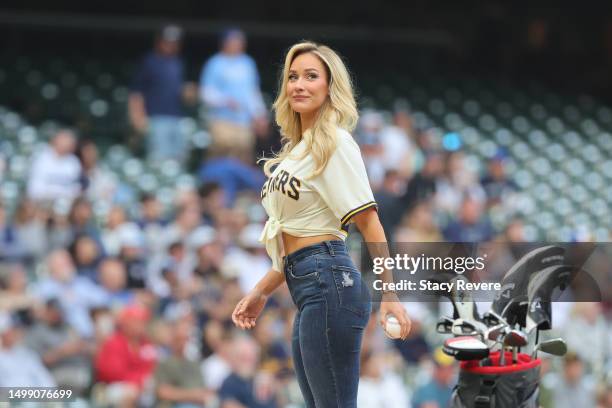 Paige Spiranac throws out the ceremonial first pitch prior to a game between the Milwaukee Brewers and the Pittsburgh Pirates at American Family...