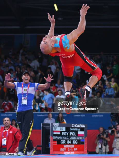 Karam Mohamed Gaber Ebrahim of Egypt celebrates winning his Men's Greco-Roman 84 kg Wrestling Semi Final against Damian Janikowski of Poland on Day...