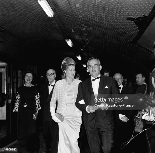 Princess Grace and Prince Rainier of Monaco take the subway as other celebs to go to 'Rex' movie theater for the premiere of the movie 'Cleopatra'...