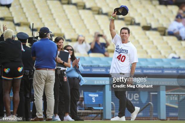 Former Dodger player Billy Bean is recognized for Pride Night before the game between the Los Angeles Dodgers and the San Francisco Giants at Dodger...