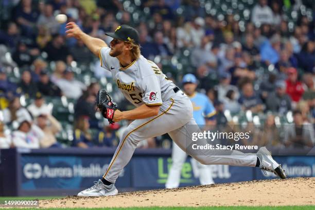 Carmen Mlodzinski of the Pittsburgh Pirates throws a pitch during the sixth inning against the Milwaukee Brewers at American Family Field on June 16,...
