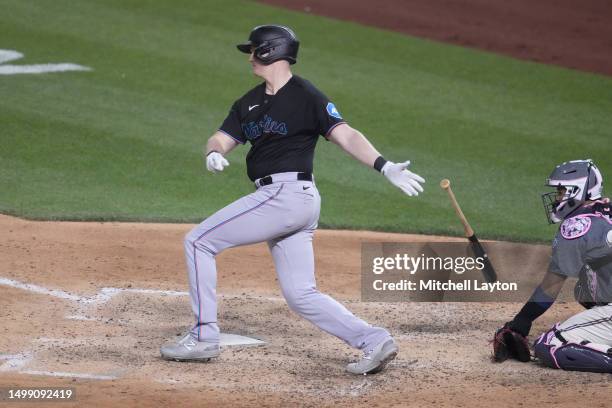 Garrett Cooper of the Miami Marlins singles in Yuli Gurriel in the eighth inning during a baseball game against the Washington Nationals at Nationals...