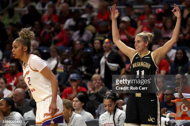Elena Delle Donne of the Washington Mystics celebrates in front of Evina Westbrook of the Phoenix Mercury in the second half at Entertainment &...
