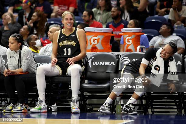 Elena Delle Donne and Kristi Toliver of the Washington Mystics share a laugh on the bench in the second half against the Phoenix Mercury in the...