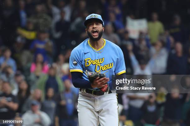 Devin Williams of the Milwaukee Brewers reacts to a strike out against the Pittsburgh Pirates during the ninth inning at American Family Field on...