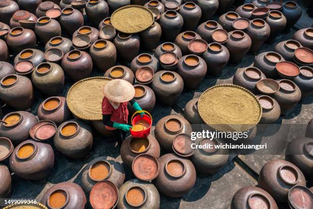 making traditional sauce in vietnam - hanoi stock pictures, royalty-free photos & images