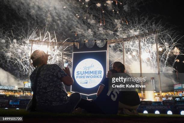 Fans watch fireworks on the field after the Kansas City Royals loss to the Los Angeles Angels at Kauffman Stadium on June 16, 2023 in Kansas City,...