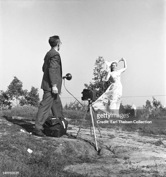 Newly signed 20th Century-Fox contract girl Marilyn Monroe poses for photographer Earl Theisen in 1947 in Los Angeles, California.