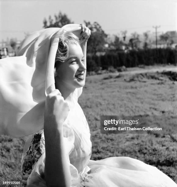 Newly signed 20th Century-Fox contract girl Marilyn Monroe poses for a portrait in 1947 in Los Angeles, California.