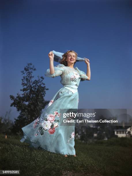 Newly signed 20th Century-Fox contract girl Marilyn Monroe poses for a portrait in 1947 in Los Angeles, California.