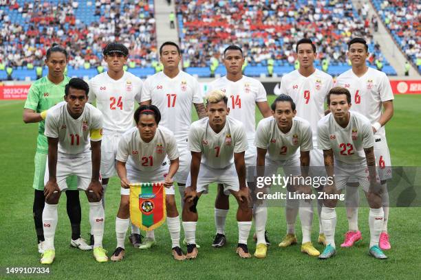 Players of Myanmar line up prior to the international friendly match between China and Myanmar at Dalian Suoyuwan Football Stadium on June 16, 2023...