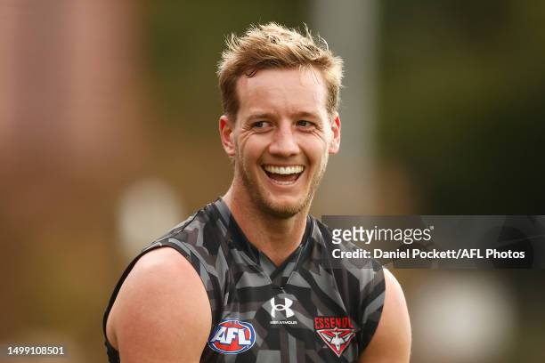 Darcy Parish of the Bombers laughs during an Essendon Bombers AFLW & AFL training session at The Hangar on June 17, 2023 in Melbourne, Australia.