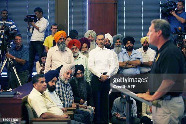 Police Chief John Edwards speaks at a press conference August 6, 2012 in Oak Creek, Wisconsin about the shootings Sunday at the Sikh Temple of...