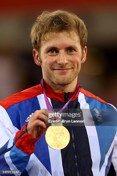 Gold medallist Jason Kenny of Great Britain celebrates during the medal ceremony for the Men's Sprint Track Cycling Final on Day 10 of the London...