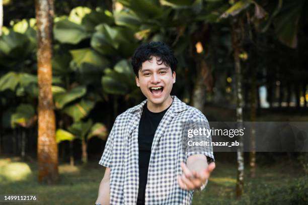 a day without laughter is a day wasted. - malay people stock pictures, royalty-free photos & images