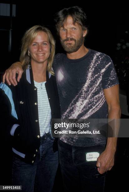 Kris Kristofferson and wife Lisa Meyers attend the screening of "Cover Up - Behind the Iran-Contra Affair" on June 24, 1988 at the Director's Guild...