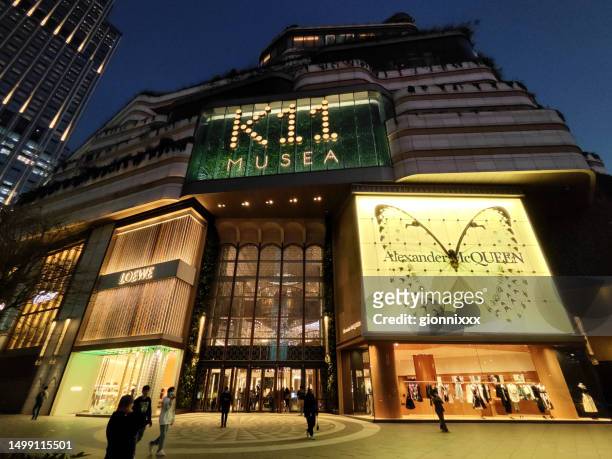 k11 musea shopping mall at victoria dockside by night, hong kong - tsim sha tsui stock pictures, royalty-free photos & images