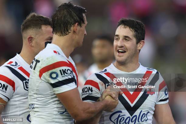 Nat Butcher and Billy Smith of the Roosters celebrate during the round 16 NRL match between Newcastle Knights and Sydney Roosters at McDonald Jones...