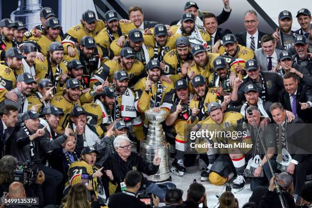 Team captain Mark Stone of the Vegas Golden Knights and teammates pose with the Stanley Cup after their 9-3 victory over the Florida Panthers in Game...