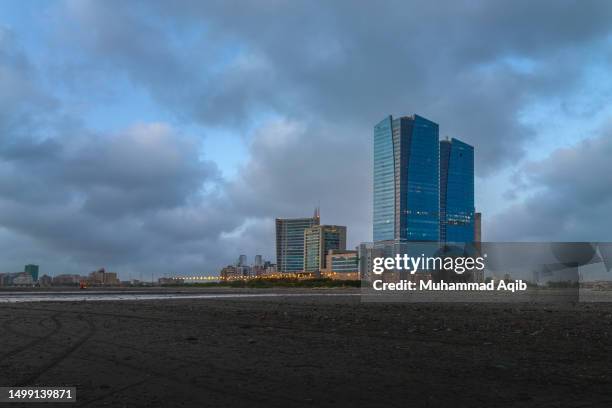 famous landmarks of karachi, clifton beach karachi in evening - clifton beach pakistan stock pictures, royalty-free photos & images