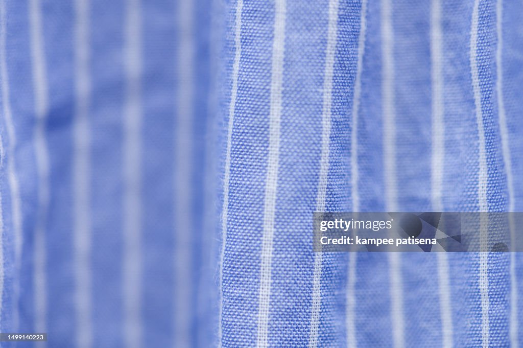 Full frame shot of Striped fabric, light blue and white striped