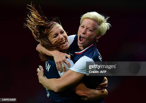 United States's midfielder Megan Rapinoe celebrates with United States's forward Alex Morgan after scoring during the London 2012 Olympic Games...