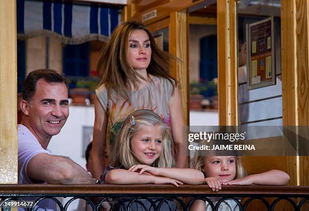 Spanish Crown Prince Felipe and Princess Letizia pose with their daughters, Leonor and Sofia in Soller on the island of Mallorca on August 6, 2012....
