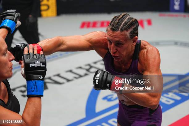 Julia Budd throws a punch against Martina Jindrova during PFL 2023 week 5 at OTE Arena on June 16, 2023 in Atlanta, Georgia.