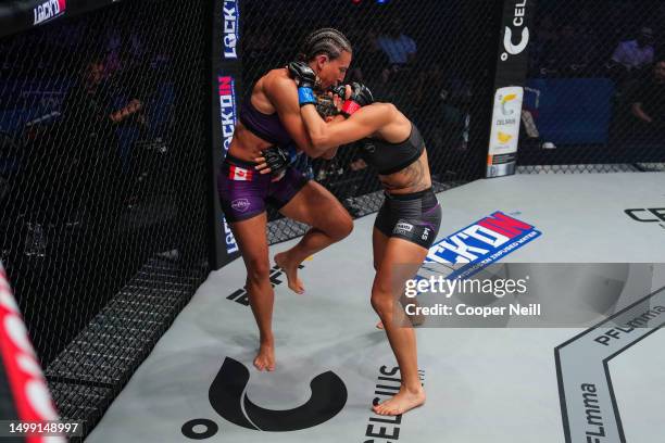 Julia Budd throws a knee against Martina Jindrova during PFL 2023 week 5 at OTE Arena on June 16, 2023 in Atlanta, Georgia.