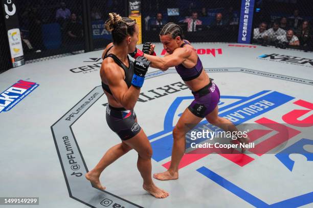 Julia Budd throws a punch against Martina Jindrova during PFL 2023 week 5 at OTE Arena on June 16, 2023 in Atlanta, Georgia.