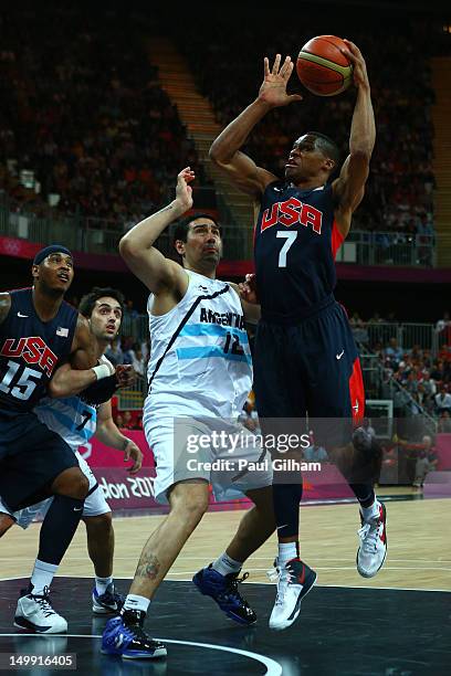 Russell Westbrook of United States goes to the basket against Martin Leiva of Argentina during the Men's Basketball Preliminary Round match on Day 10...