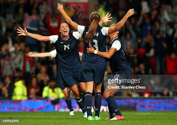 Alex Morgan of the United States celebrates with Sydney Leroux and Abby Wambach after she scored in extra time during the Women's Football Semi Final...