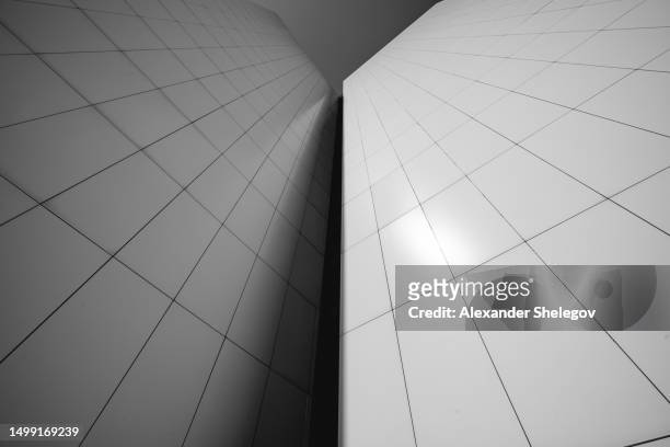 architecture photography, the building of german music archive and german museum of books and writing in leipzig. geometric composition, lines of building exterior and abstract construction of modern facade. black and white photo. - from the archives space age style stock pictures, royalty-free photos & images