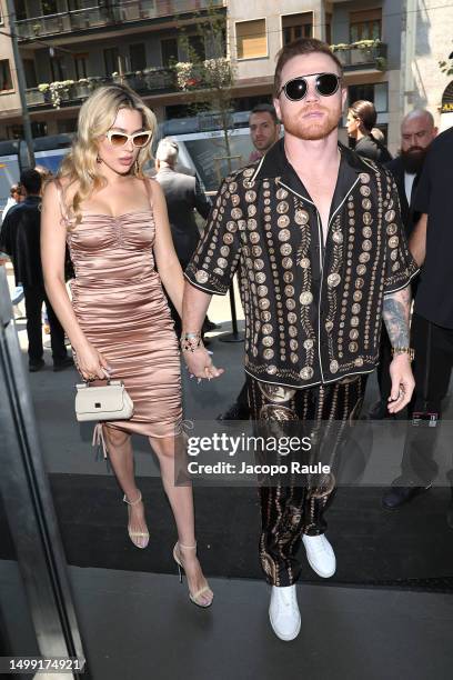 Fernanda Gomez and Saul Canelo Alvarez are seen arriving at the Dolce&Gabbana Spring/Summer 2024 fashion show during the Milan Fashion Week menswear...