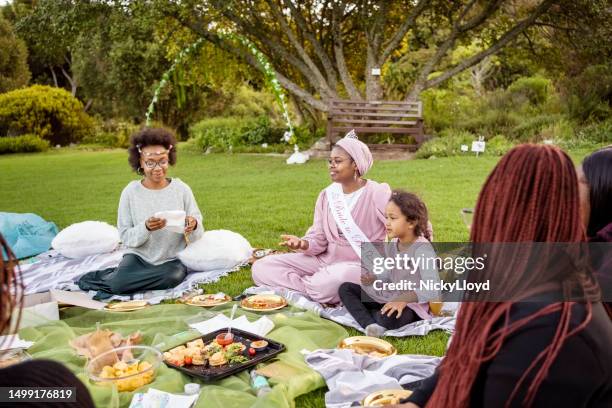 group of women friends giving the bride a bridal shower party - small wedding ceremony stock pictures, royalty-free photos & images