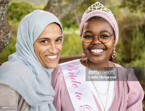 https://media.gettyimages.com/id/1499177721/photo/beautiful-muslim-bride-with-her-friend-smiling-at-bridal-shower.jpg?s=612x612&w=gi&k=20&c=VCXnZFymaGfEaH6scHxNEtm6Kl-JmBGI6hgr08Zh2f4=