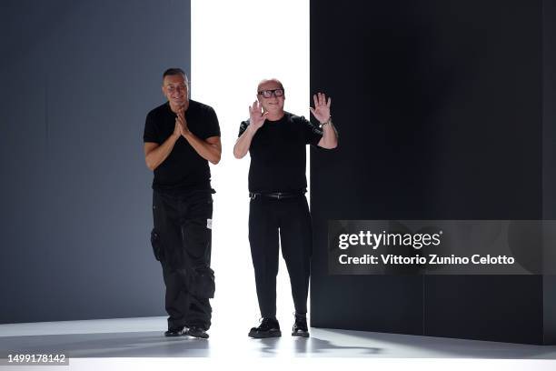 Fashion designers Stefano Gabbana and Domenico Dolce acknowledge the applause of the audience at the Dolce&Gabbana Spring/Summer 2024 fashion show...