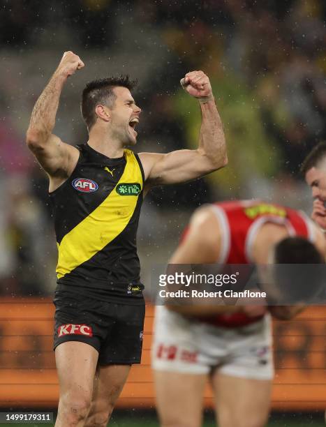 Trent Cotchin of the Tigers celebrates on the final siren after the Tigers defeated the Saints during the round 14 AFL match between Richmond Tigers...