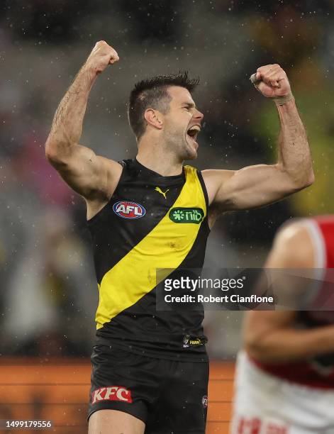 Trent Cotchin of the Tigers celebrates on the final siren after the Tigers defeated the Saints during the round 14 AFL match between Richmond Tigers...