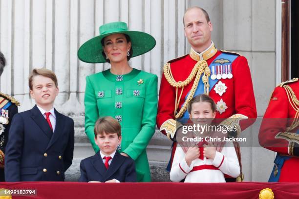 Prince George of Wales, Prince Louis of Wales, Catherine, Princess of Wales, Princess Charlotte of Wales and Prince William, Prince of Wales stand on...