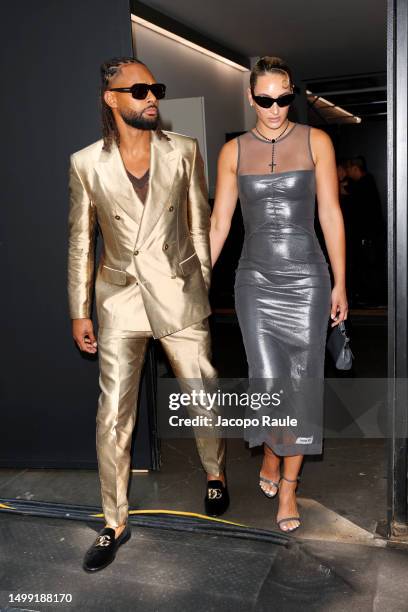 Patty Mills and Alyssa Mills are seen leaving the Dolce&Gabbana Spring/Summer 2024 fashion show during the Milan Fashion Week menswear spring/summer...