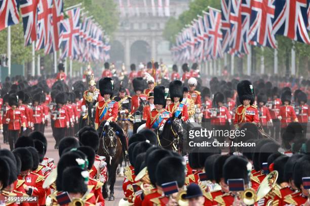 Prince William, Prince of Wales, Prince Edward, Duke of Edinburgh, King Charles III and Princess Anne, Princess Royal are riding down the Mall on...