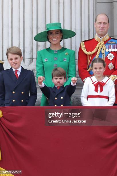 Prince George of Wales, Prince Louis of Wales, Catherine, Princess of Wales, Princess Charlotte of Wales and Prince William, Prince of Wales stand on...